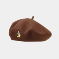 Detail of dark brown wool beret featuring delicate yellow banana embroidery on fabric - One Size / Dark Brown