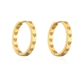 Close-up of gold plated hoop earrings with heart-shaped zircon stones and polished finish - Dark Red