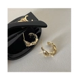 Minimalist golden earrings with irregular lava texture and artistic wavy design - Irregular Metallic Studs - Gold