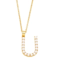 Detailed view of a gold-plated necklace featuring a letter U pendant with inlaid pearls - Letter U