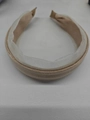 Elegant wide knit headband in soft beige cream color for a voluminous hair look - Brown