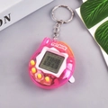 Pink transparent electronic virtual pet game machine with key ring and yellow buttons - Retro/Transparent Pink