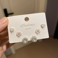 Close-up of 3-pair 925 silver stud earring set with hearts, flowers and pearls - 26# Silver Flower (6 Pairs)