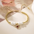 Elegant 18K gold plated beaded bracelet with red heart zircon pendant and adjustable cord - Red Gemstone Heart (31875)