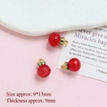 Detailed view of red fruit pendants with gold loops and 9x13mm dimension scale - Pomegranate