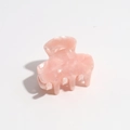 Detail of light pink leopard print hair claw with marble texture on white background - Marble Pink