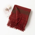 Plaid checkered scarf in red and green with fringe detail and a cozy wool blend - Red