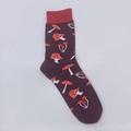 Detailed close-up of dark purple cotton socks with red mushrooms and ribbed cuffs - One Size / Red Mushroom