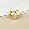 Detail of heart-shaped gold jewelry with a central natural pearl inlay and polished finish - Heart Gold Border Pearl