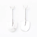 Macro shot of silver vintage shovel charms with Russian engraving and smooth metal finish - Bright Silver