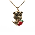 Golden tiger pendant necklace holding a red strawberry with enamel details on white background - Tiger with Strawberry (Box Chain) / Gold
