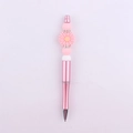 Detail of pink metal beaded pen with silicone daisy flower and rhinestone spacers - Pink and White Daisy
