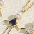 Cartoon girl pendant necklace with white pearl and blue triangle zircon in gold finish - Royal Blue Zirconia