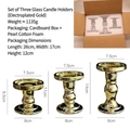 Three-piece set of golden electroplated glass candle holders in assorted heights - Set of 3 / Electroplated Gold Set