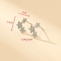 Sparkling zircon snowflake star earrings in silver finish showing size 1cm by 1.3cm - Silver Star Curved Style