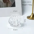 Clear pumpkin-shaped glass candle holder with ribbed texture and beaded rim detail - Small Stripe