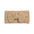 Detail of soft khaki cable knit texture and large bow on flexible nylon baby headband - Light Coffee
