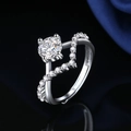 Adjustable silver ring featuring a round solitaire diamond and wavy pavé accents - White Diamond Ljz-246 / Adjustable Open