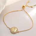 Adjustable gold plated bracelet with a zircon-encrusted Virgin Mary circular charm pendant - Round Virgin Mary