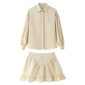 Flat lay detail of beige long-sleeve lapel shirt and ruffled skirt set in silk texture - S / Apricot