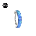 Macro detail of sterile F136 titanium segment ring set with vibrant blue opal stone - Wide OP05 Side View (Blue)