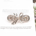 Barrette à cheveux nœud en strass Morandi avec cristaux et finition métal rose - Pompon / Blanc Frais