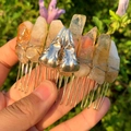Handmade crystal hair comb with orange raw stones and silver raven skull decorations - Citrine + Silver Crow Skull