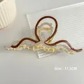 Pince à cheveux ondulée en métal doré avec émail brun rouge, taille de 11,5 cm de long - Minimaliste Couleur Café