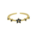 Adjustable 18k gold plated flower ring featuring deep blue zirconia birthstone gems - September