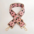 Close-up of woven ethnic pattern strap with gold metal buckle and lobster clasp detail - Pink / Gold Buckle