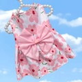 Detail of pink cherry blossom pet dress with silk bow on a pearl hanger - Pink Trumpet Flower Dress