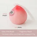 Pink peach-shaped scented soy candle with a realistic gradient finish and peach fragrance - Red Heart