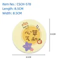 Round cat and apple pattern compressed wood pulp sponge measuring 8.5x8.5 cm - Peaceful Apple