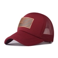 Detail of burgundy trucker hat with breathable mesh and American flag leather patch - Burgundy