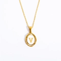 Gold plated titanium steel oval necklace featuring a letter V pendant on white background - Letter V - Gold