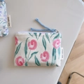 Close-up of a floral cotton zipper pouch for cosmetics and small accessories - Rose Pink Circle Flower