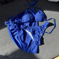 Three-piece royal blue bikini set with textured fabric and matching sarong skirt - Blue