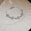 Bracelet élégant en perles d'eau douce avec breloques trèfle argentées sur plateau - Full Diamond Four-Leaf Clover Style (29#) / Argent