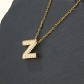 Gold plated letter Z pendant necklace with zircon stones on a dark textured background - Letter Z (Pendant Only)