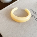 Minimalist cream yellow acrylic open bangle bracelet with a smooth geometric finish - Yellow with Marble Pattern