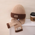 Detail of winter knitted hat and scarf set in khaki and brown with min label - Set / Khaki