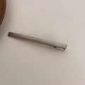 Minimalist metallic light gold hair clip for women with durable spring bar design - Long Bar Clip