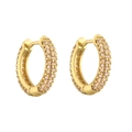 Detail of gold huggie hoop earrings featuring three rows of pave-set clear zircon stones - Gold Pink Zirconia