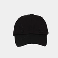 Detailed view of the distressed edges and ripped fabric on this black cotton baseball cap - Adjustable / Black