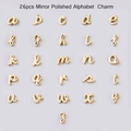 Set of 26 gold mirror polished alphabet charms with lowercase script font and holes - Gold