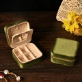 Olive green velvet travel jewelry box with mirror and ring slots shown in dual views - Velvet Army Green (With Mirror)