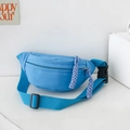 Sky blue kids nylon chest bag with purple braided zipper pulls and adjustable strap - Blue