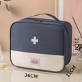 Navy and beige first-aid pouch with cross icon and top handle for travel - Extra Large / Blue