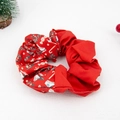 Detail of Christmas velvet scrunchie featuring festive prints and red fabric - Christmas Print 05# Red (Candy+Holly+Boot)
