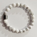 Elastic white marble stone bead bracelet with a magnetic striped cylindrical bead - Natural White Turquoise